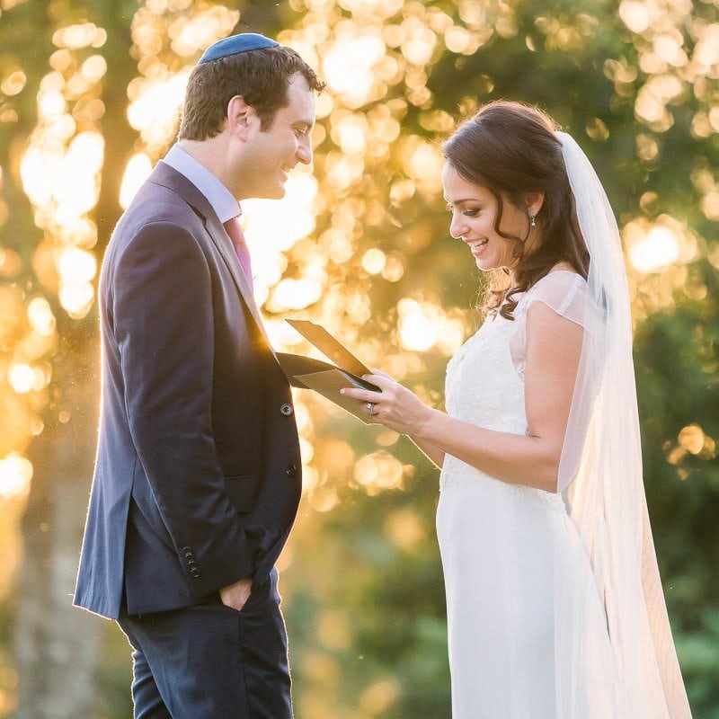 bride reads groom note as they share a private moment