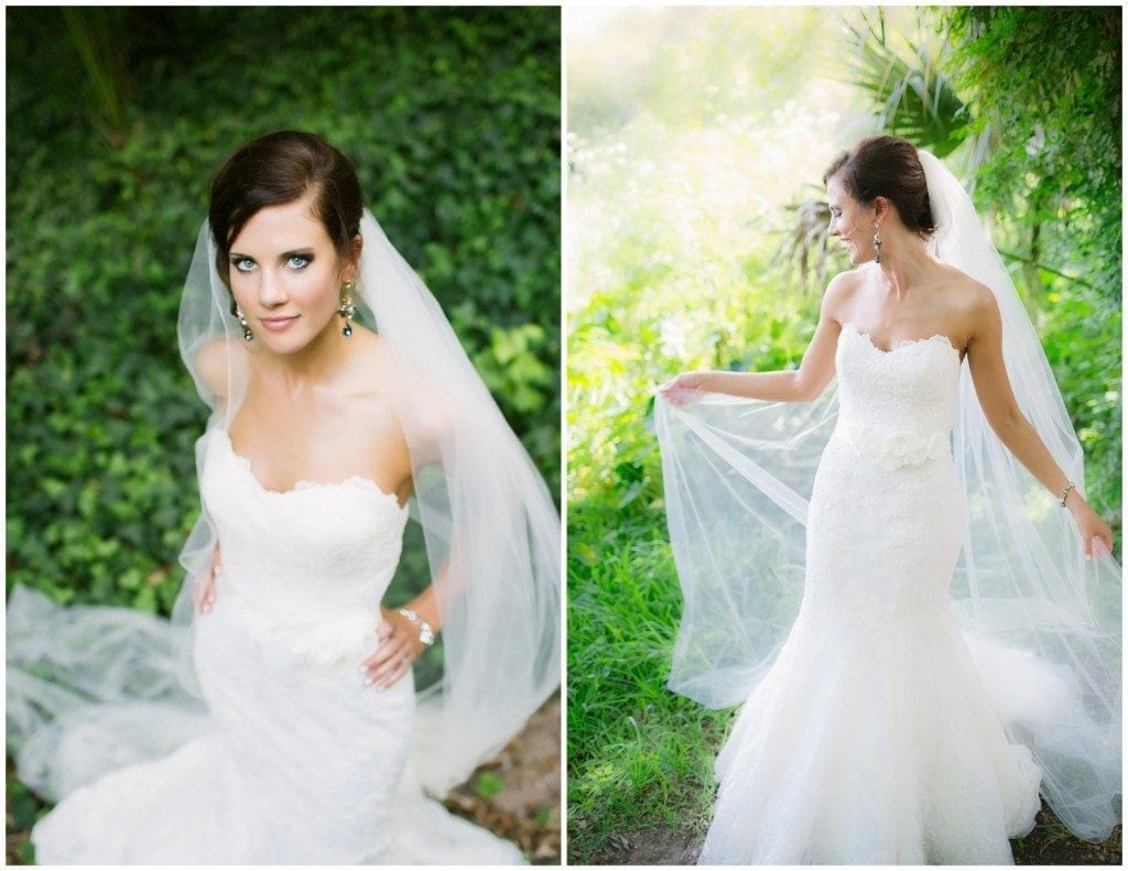 Bride pulling her long veil around her while taking her bridal portraits at Laguna Gloria.
