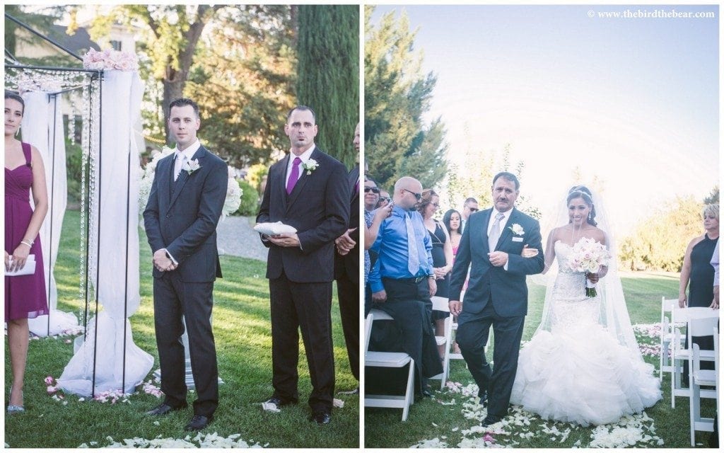 Bride walks down the aisle to her groom during her wedding ceremony at Park Winters.
