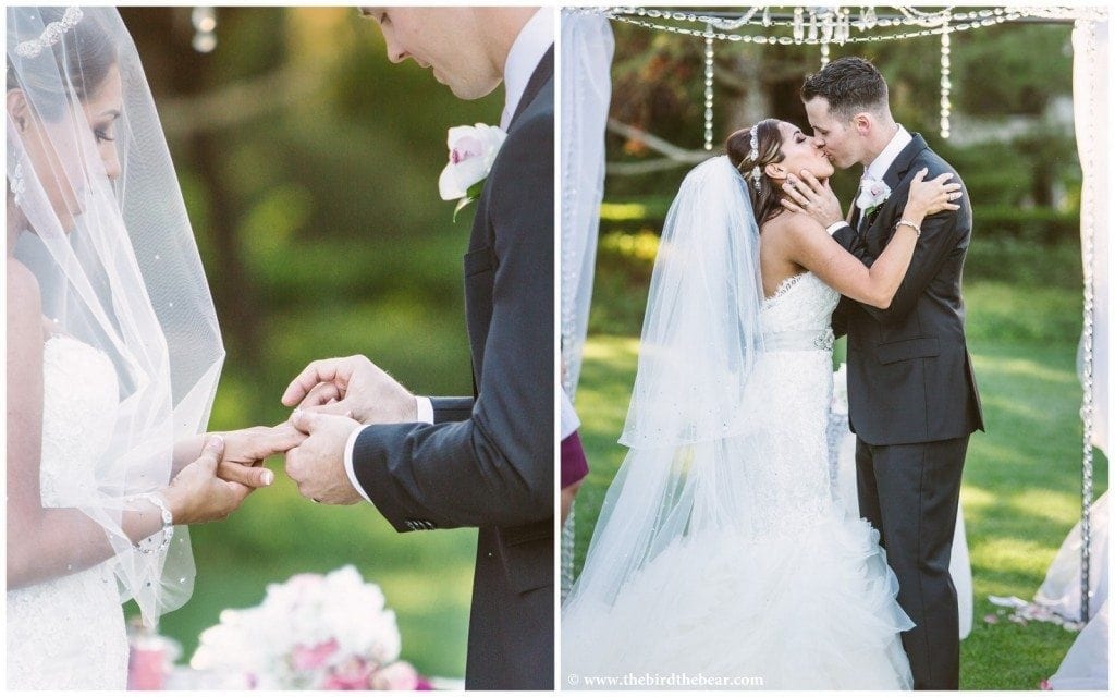 The bride and groom exchange rings during their wedding ceremony at Park Winters.