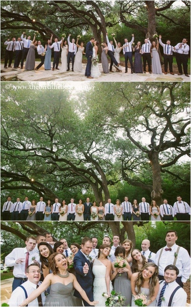 The bridal party cheer for the bride and groom under the large trees outside of Mercury Hall.
