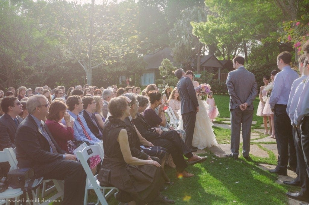 father of the bride giving bride away