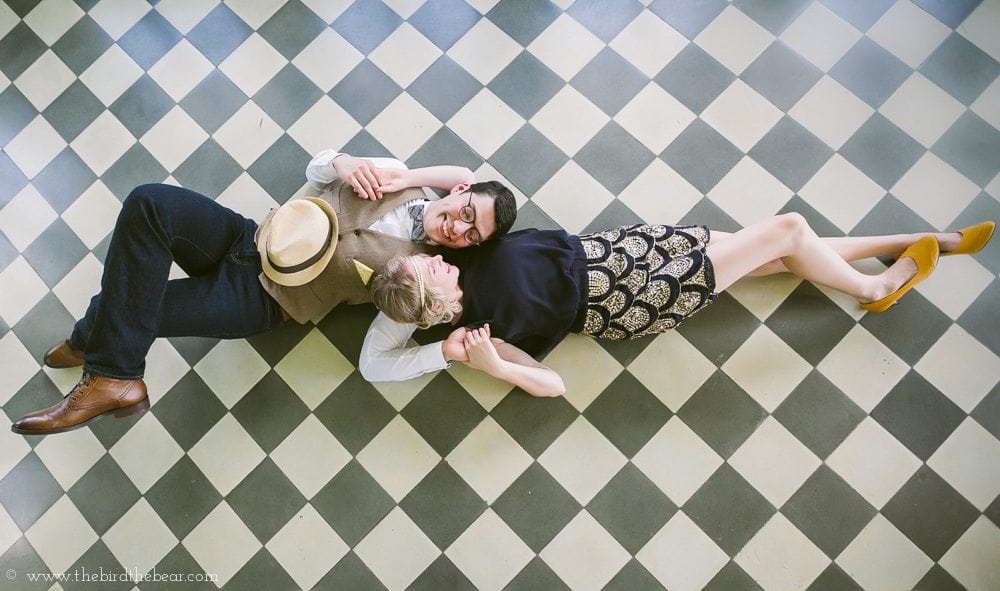 Bride and groom wearing 1920's style clothing for their engagement session at Laguna Gloria.