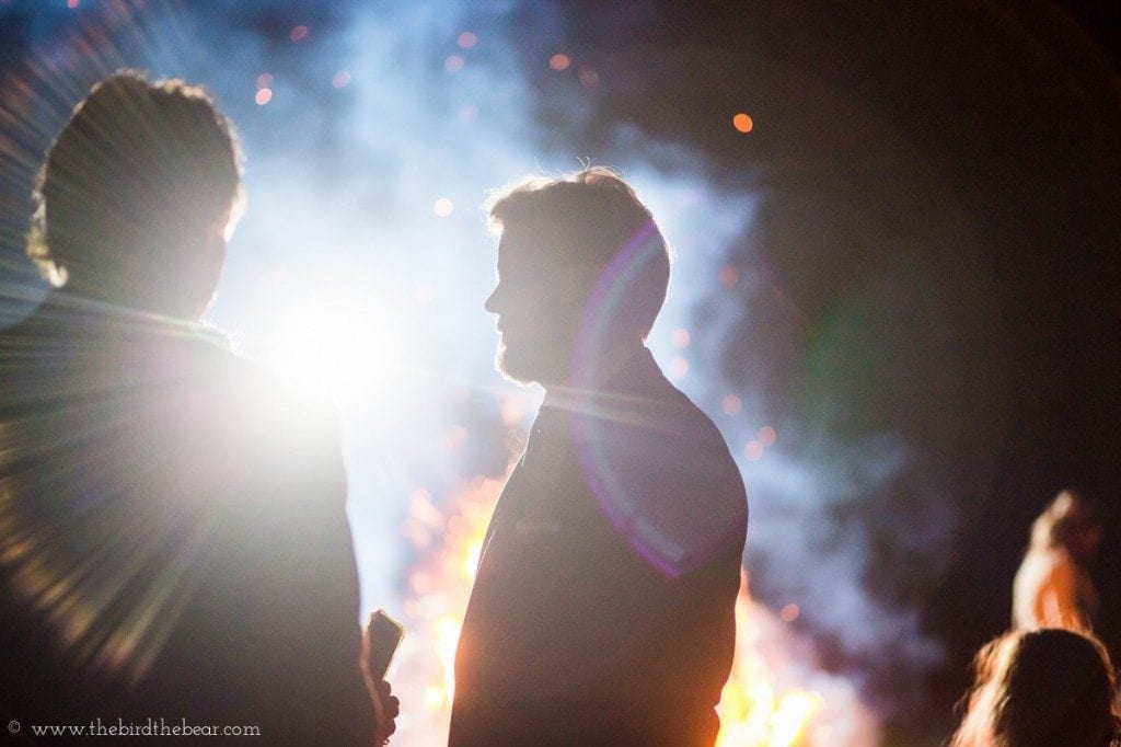 amazing wedding reception in front of bonfire