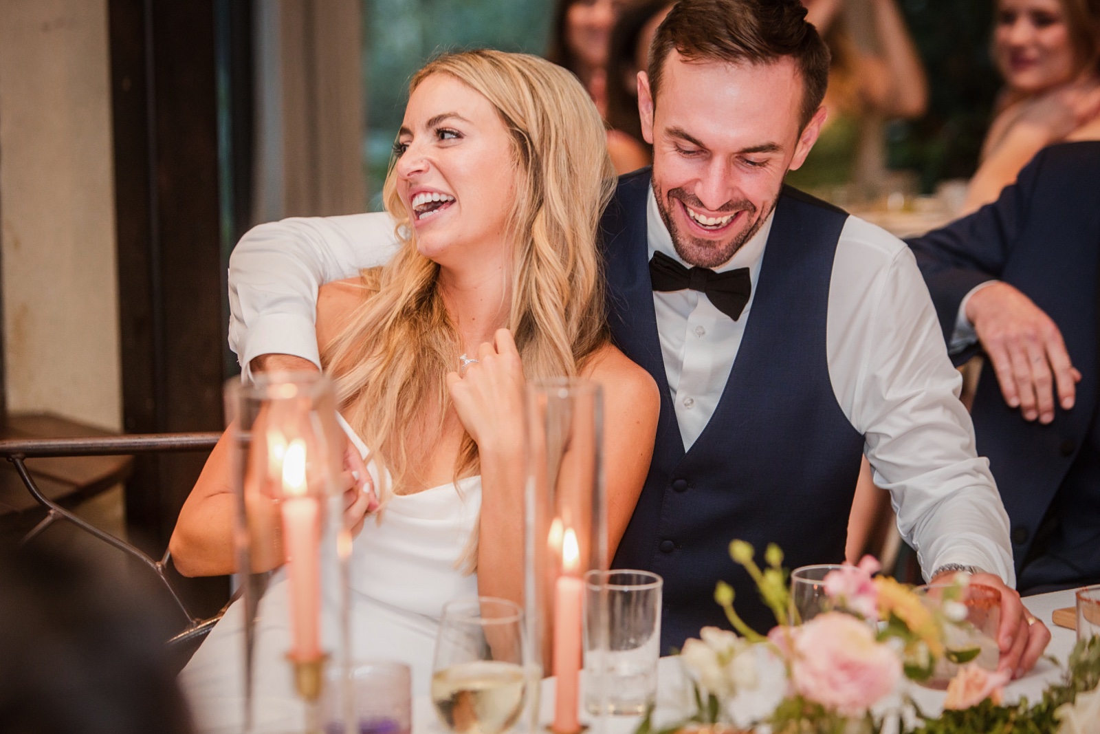 Garter toss tradition during Barr Mansion wedding reception festivities