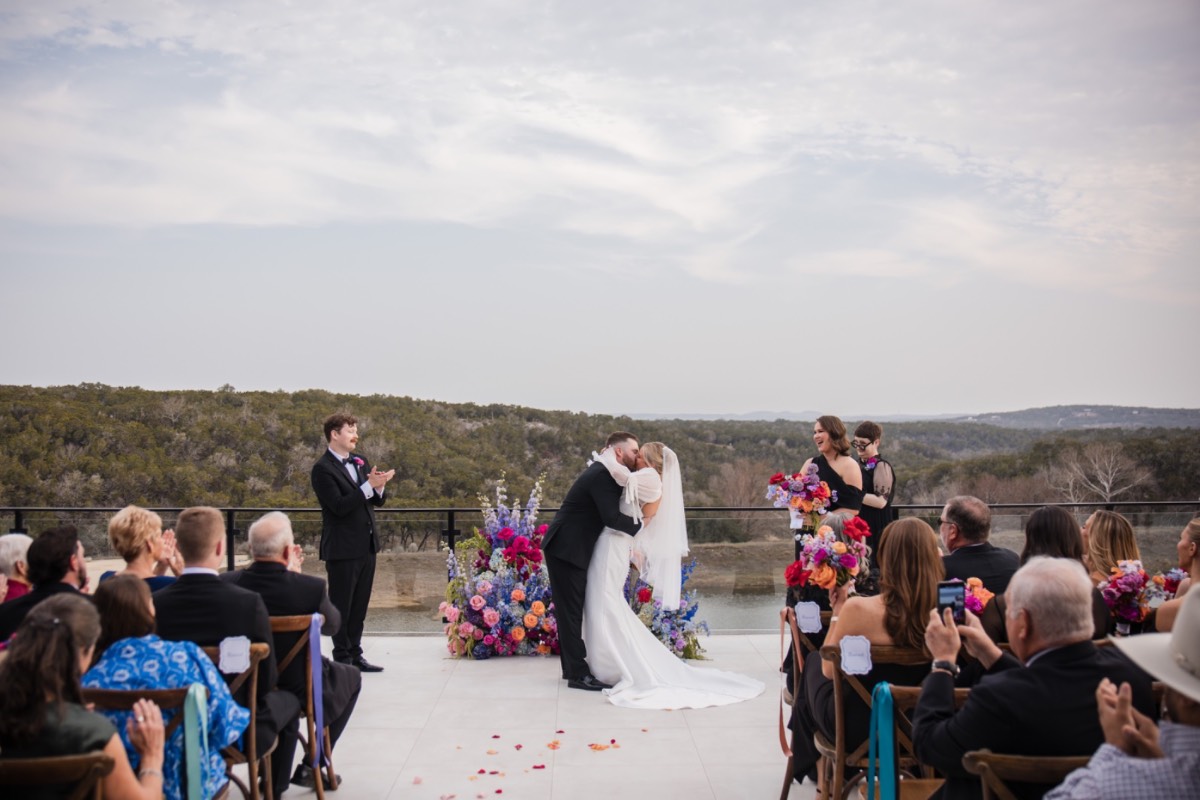 Cameron reading letter from bride before Videre Estate wedding ceremony