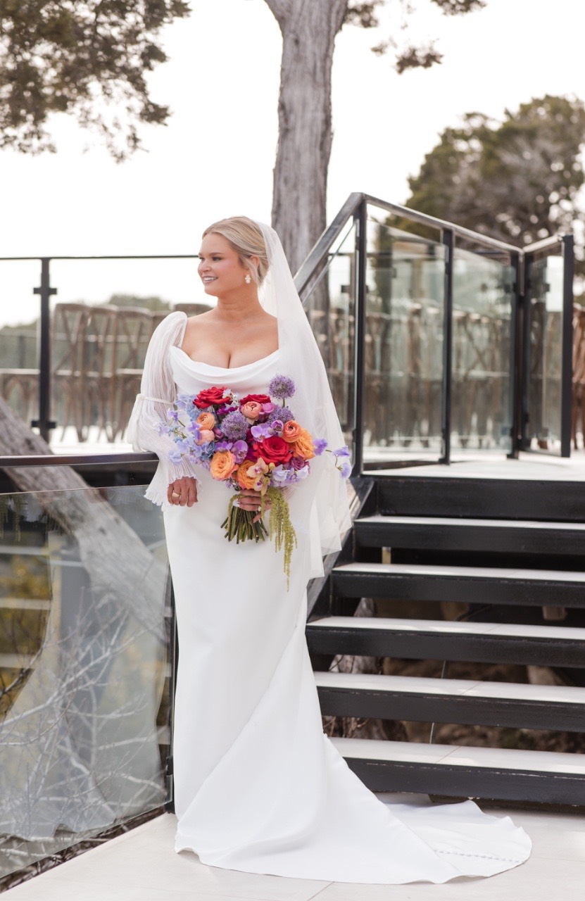 Wedding invitation suite featuring Cora and Cameron's Wimberley venue details
