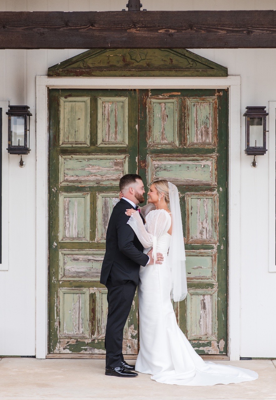 Wedding rings on invitation suite at The Videre Estate venue