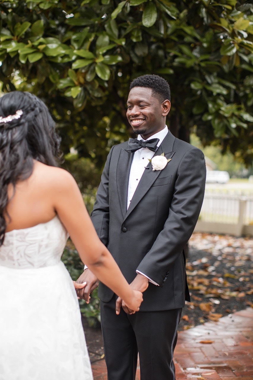 Groom H with best man before first look at venue