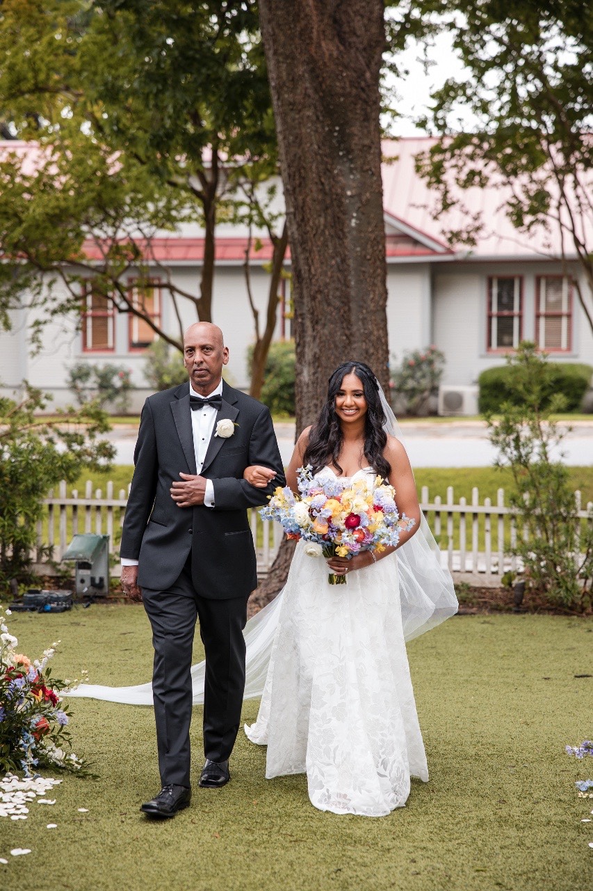 Bride N and groom H embrace after first look Woodbine Mansion