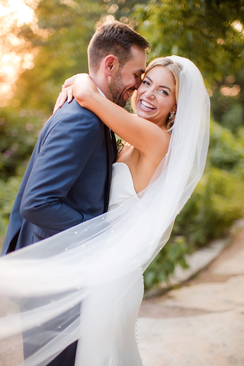Sarah's dress flowing during romantic Barr Mansion wedding portraits