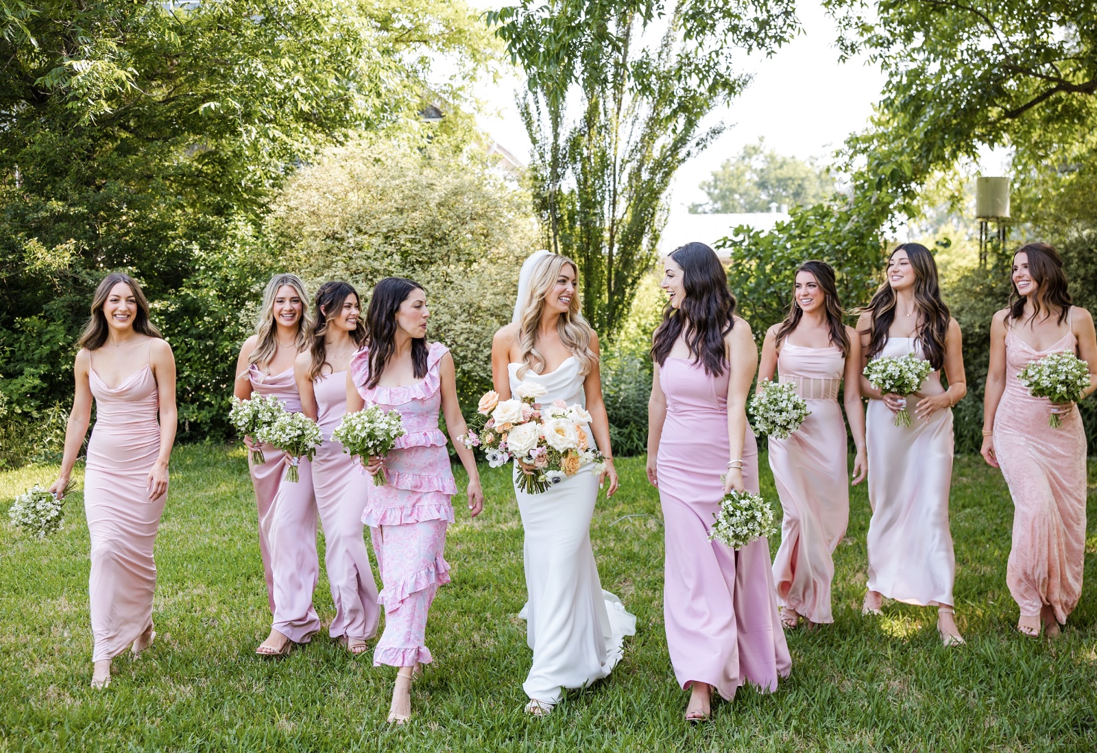 Wedding guests cheering during Barr Mansion ceremony recessional celebration