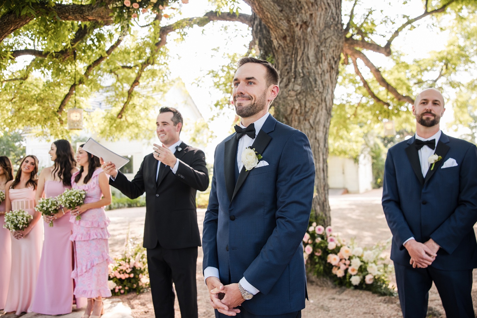 Family formal portraits on Barr Mansion steps after Austin ceremony