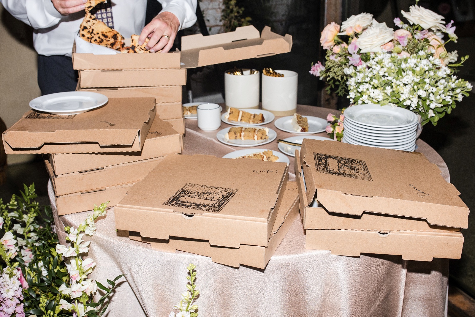 Wedding guests enjoying drinks on Barr Mansion's scenic outdoor space