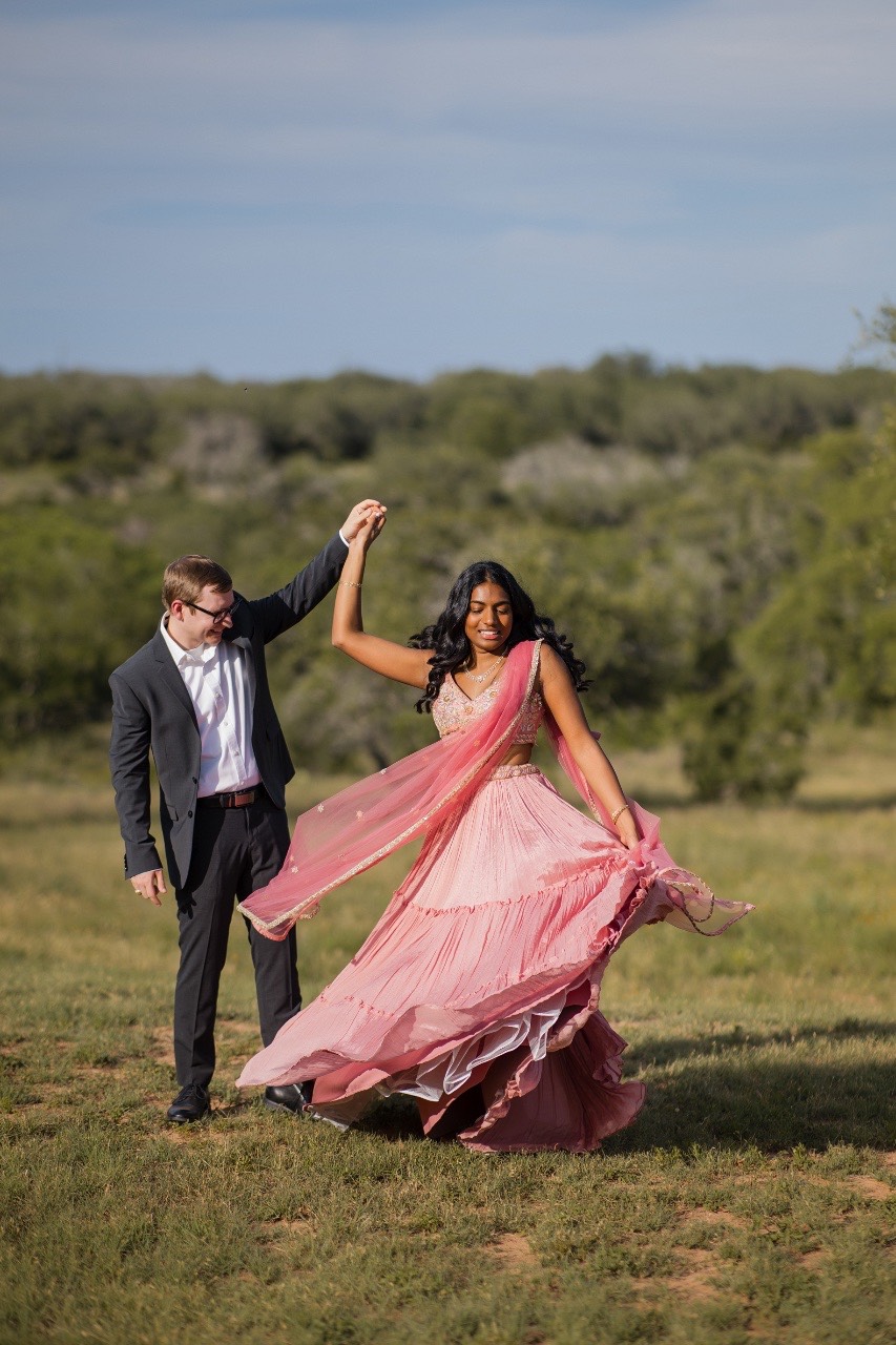 Sreya getting ready on wedding day at Two Streams One Heart Ranch Spicewood Texas