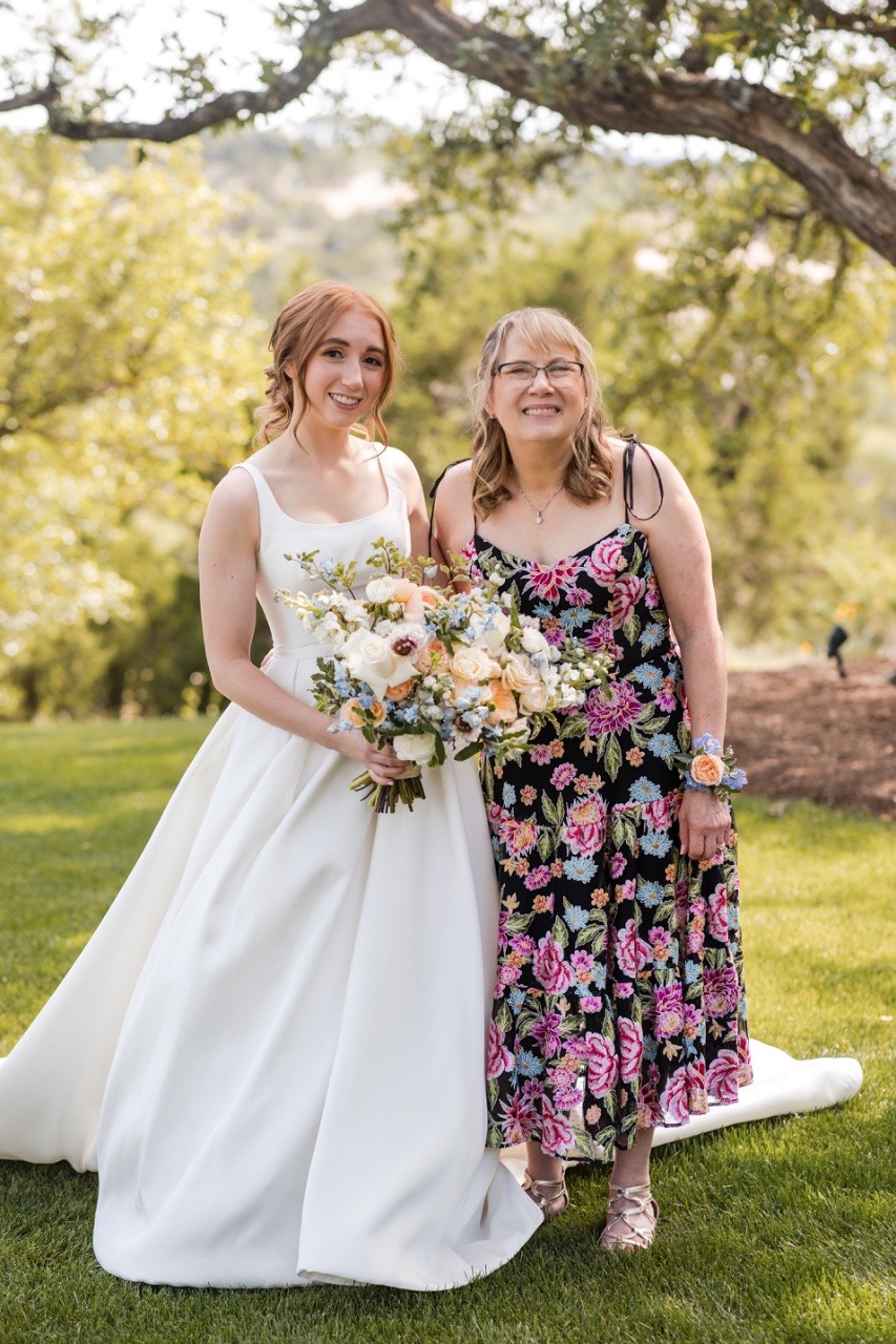Close-up of bride's bouquet at O and C's Canyonwood Ridge wedding