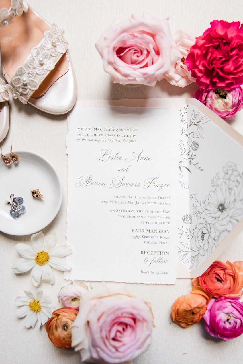 Hair and makeup artist styling L for Barr Mansion Austin wedding