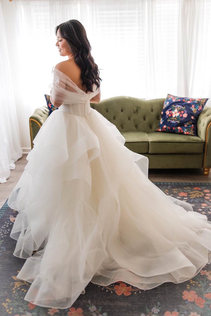 L walking down the aisle at Pecan Springs Ranch Austin Texas ceremony