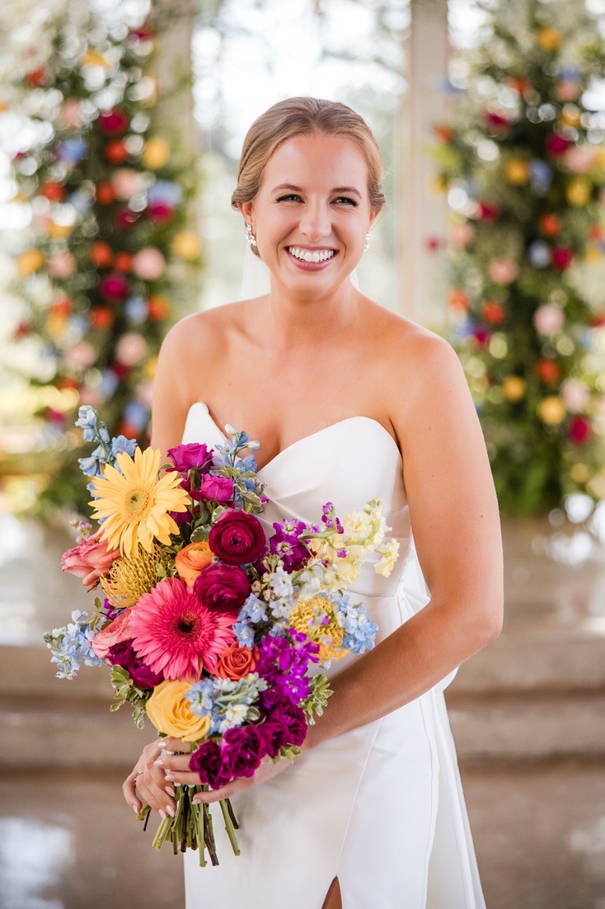 A and M sharing a private first look among oak trees at Canyonwood Ridge Dripping Springs