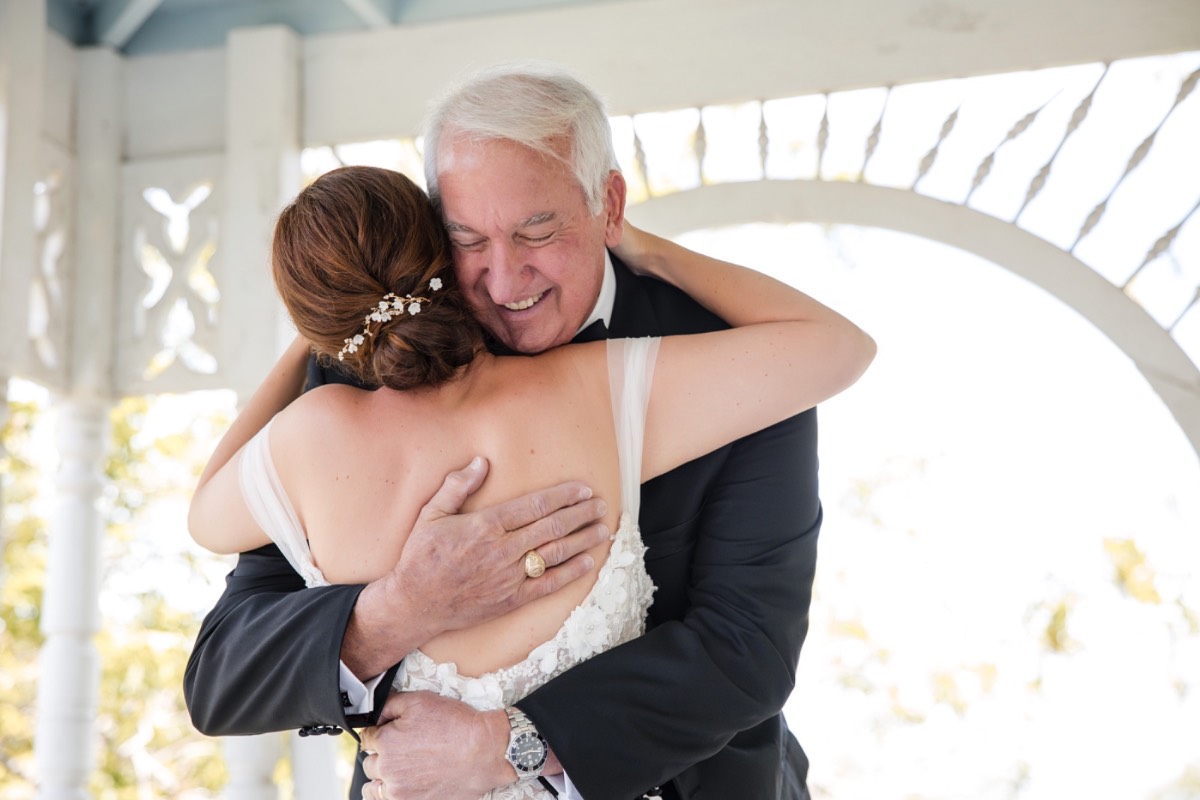 Groom S with best man at Barr Mansion summer wedding in Texas