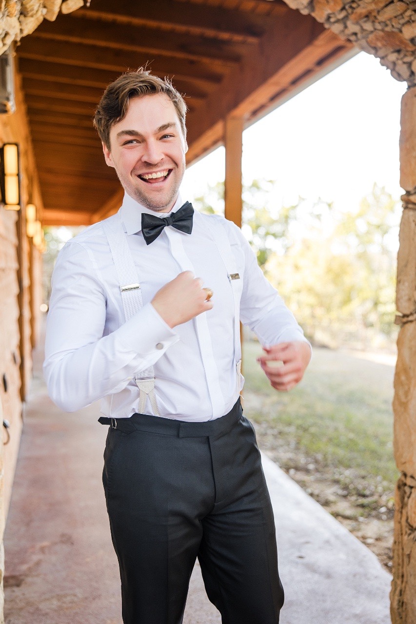 Just married moment exiting Ian's Chapel at Camp Lucy wedding