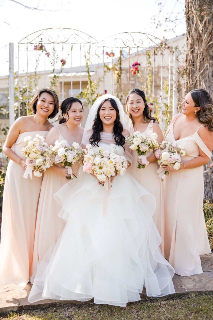 L and M holding hands during emotional vows at Pecan Springs Ranch Austin
