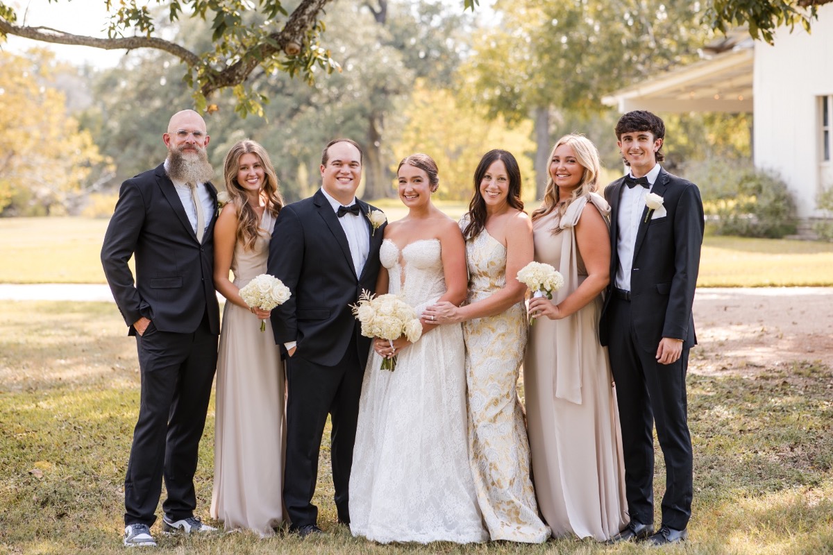 Bride and groom exchanging vows at Pecan Springs Ranch in Austin