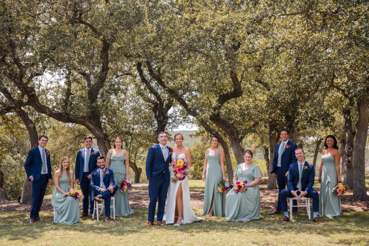 Wide shot of A and M's first look on the great lawn at Canyonwood Ridge