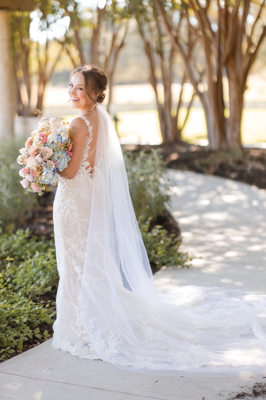 Bride processing down aisle during Garey House Georgetown Texas wedding