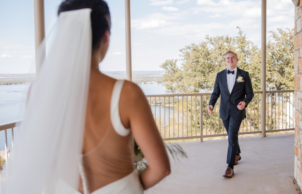 Bride and groom embracing after first look at The Retreat at Balcones Springs