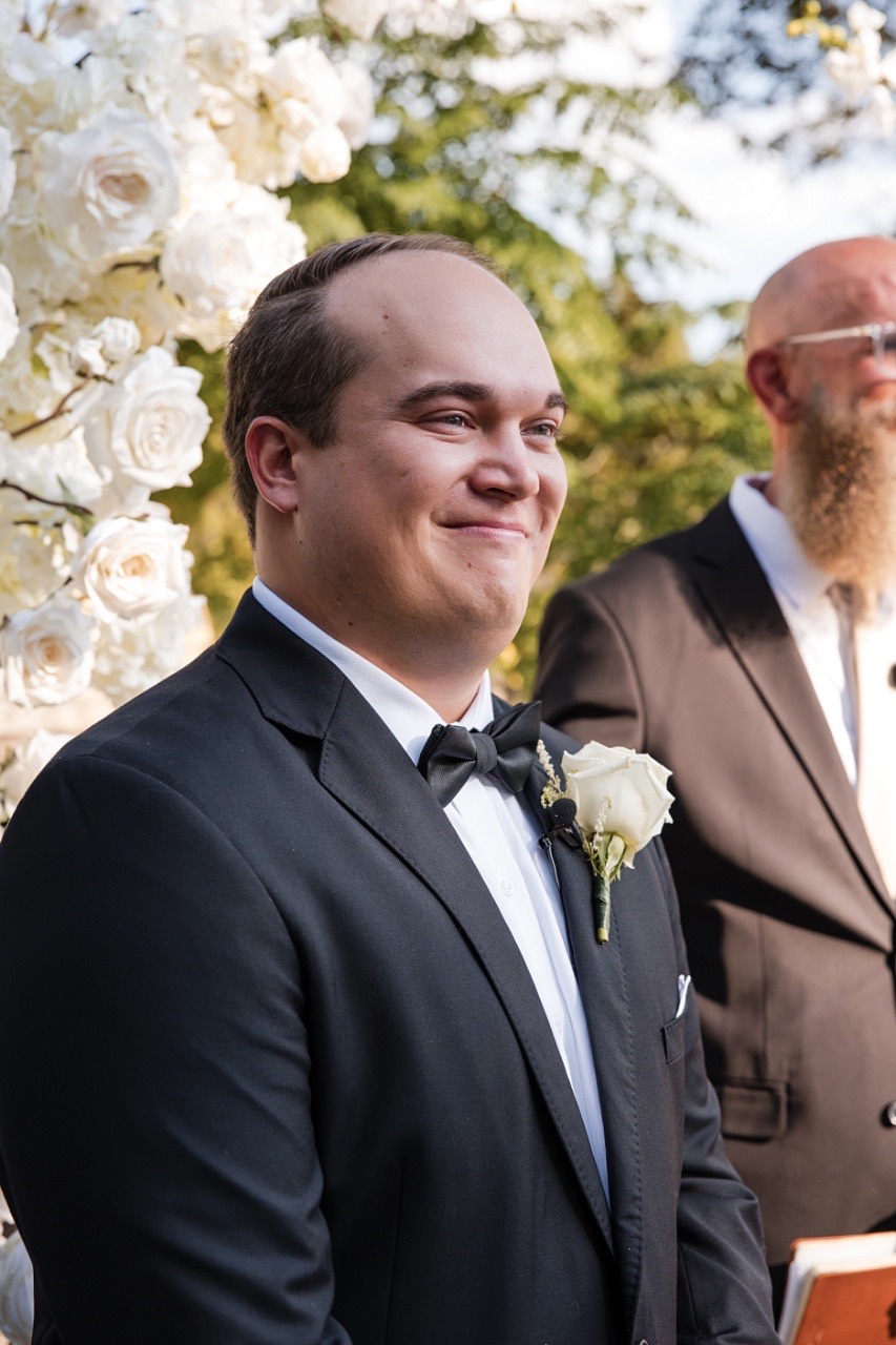 The Bird and The Bear videographer capturing first kiss at altar