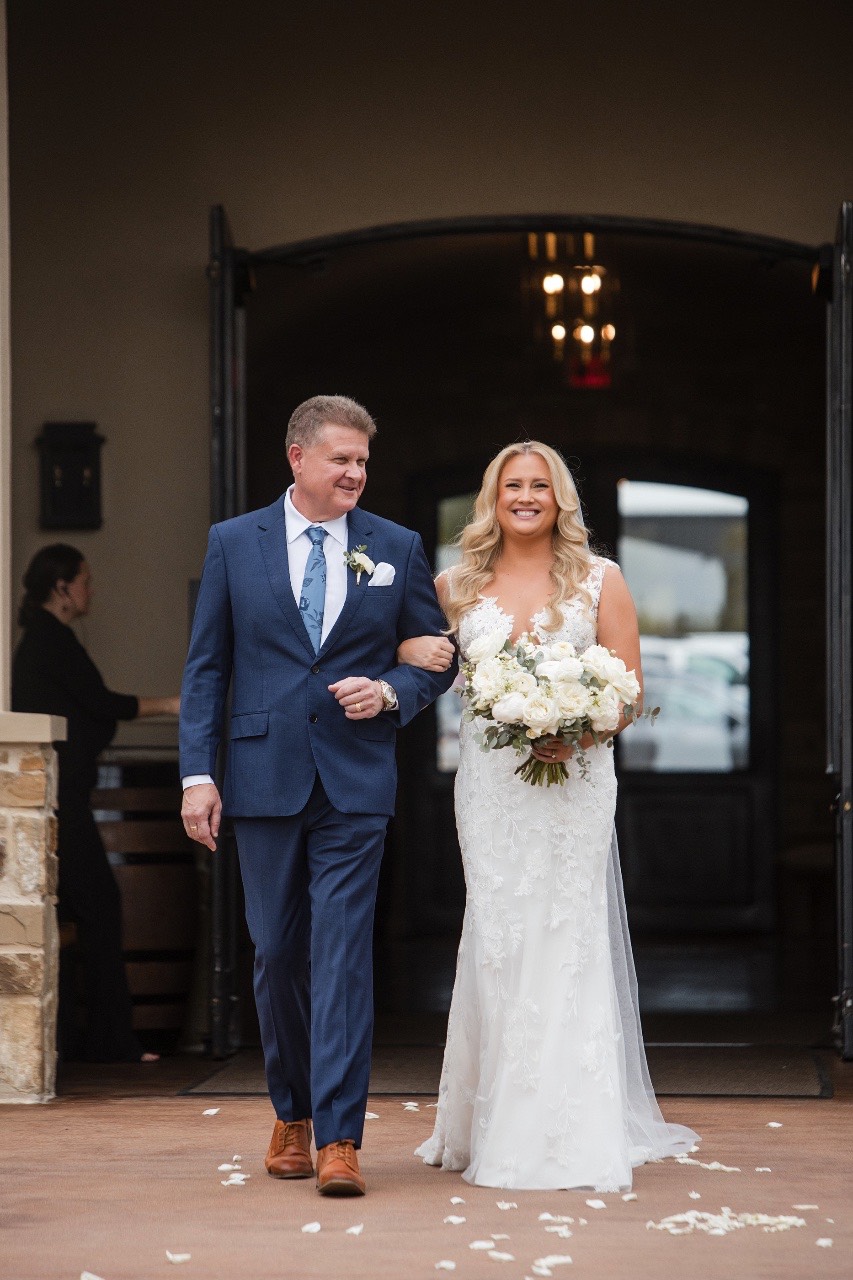 Bride and groom holding hands at first look, Canyonwood Ridge outdoor wedding