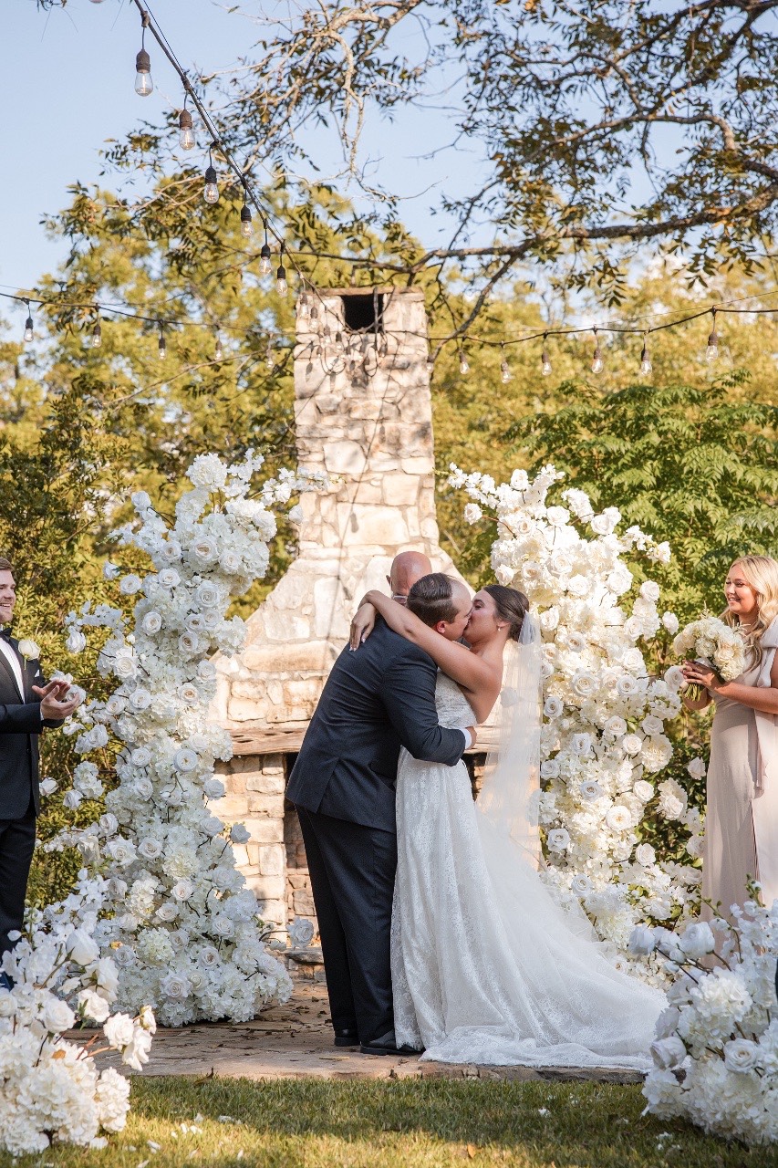 Wedding party walking together at Pecan Springs Ranch Austin Texas venue