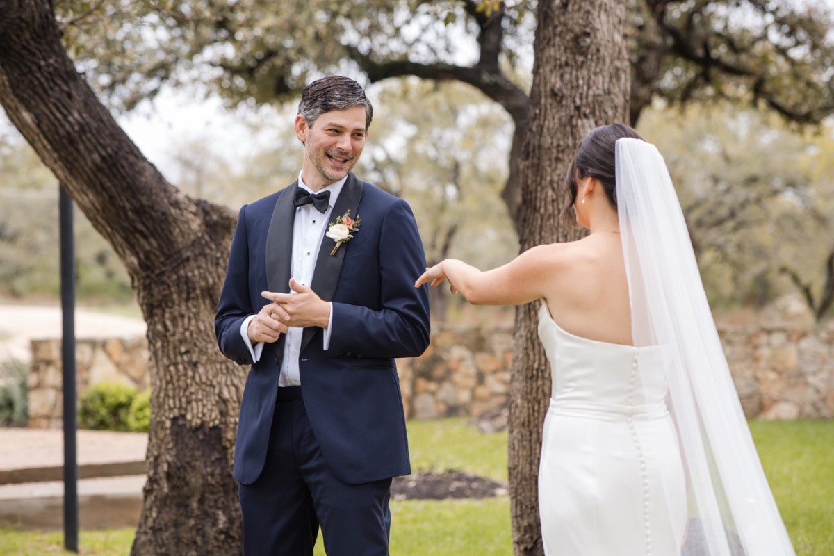 Addison Grove wedding ceremony with K and J exchanging vows in Austin