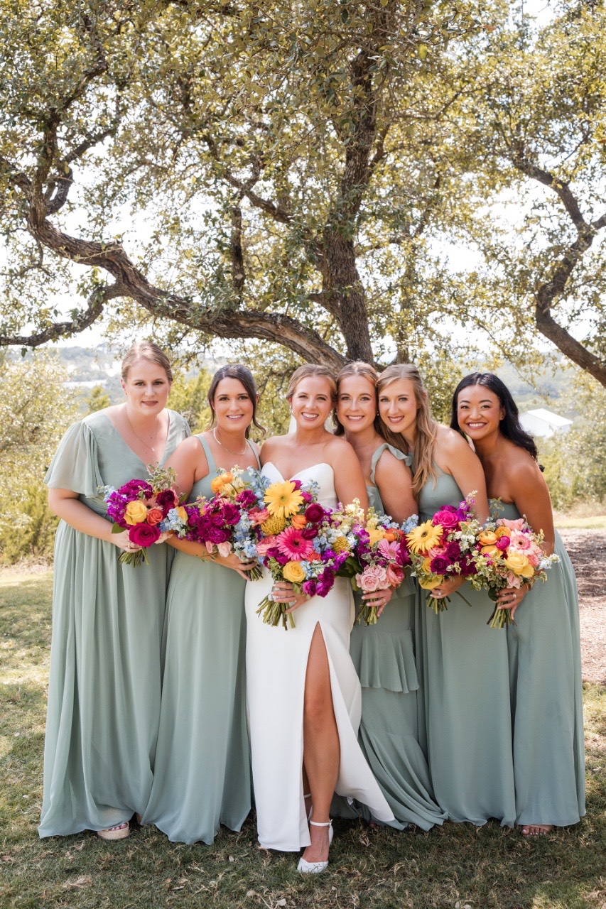 Bride A walking down the aisle at her Canyonwood Ridge wedding ceremony
