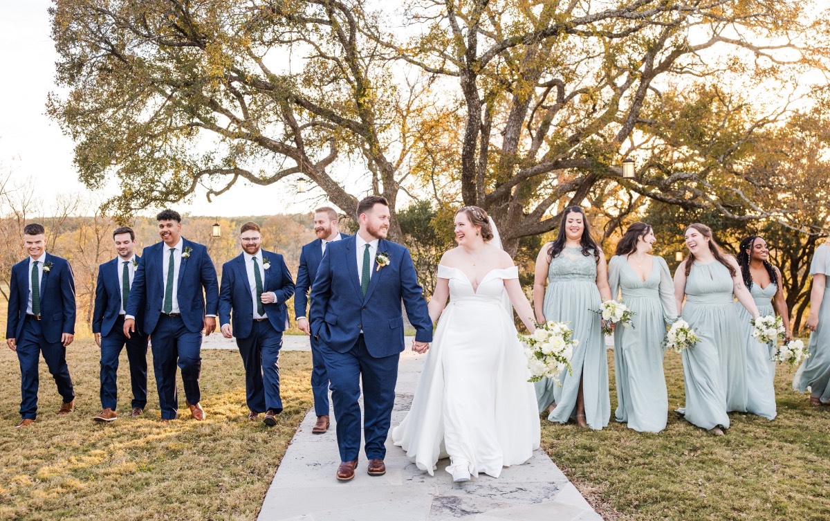 E and D pose during golden hour at Liberty Hill's Highpointe Estate venue.