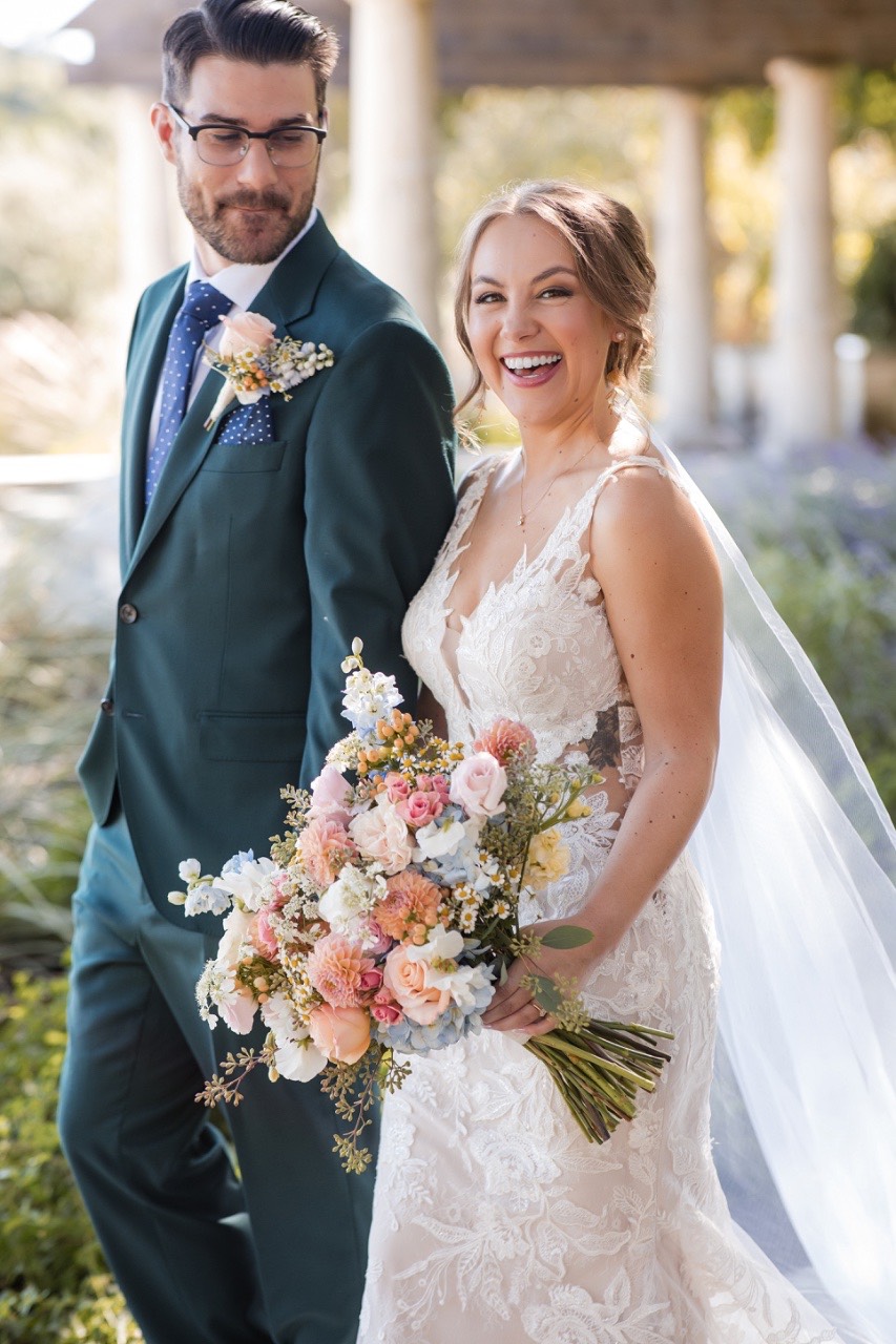 D and J holding hands during ceremony at Garey House Georgetown