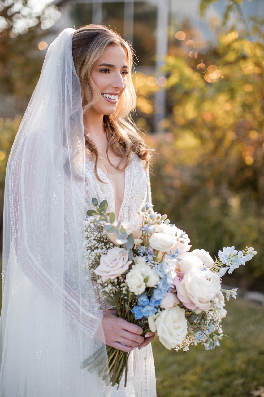 A and S embrace during first look photographed at Barr Mansion.