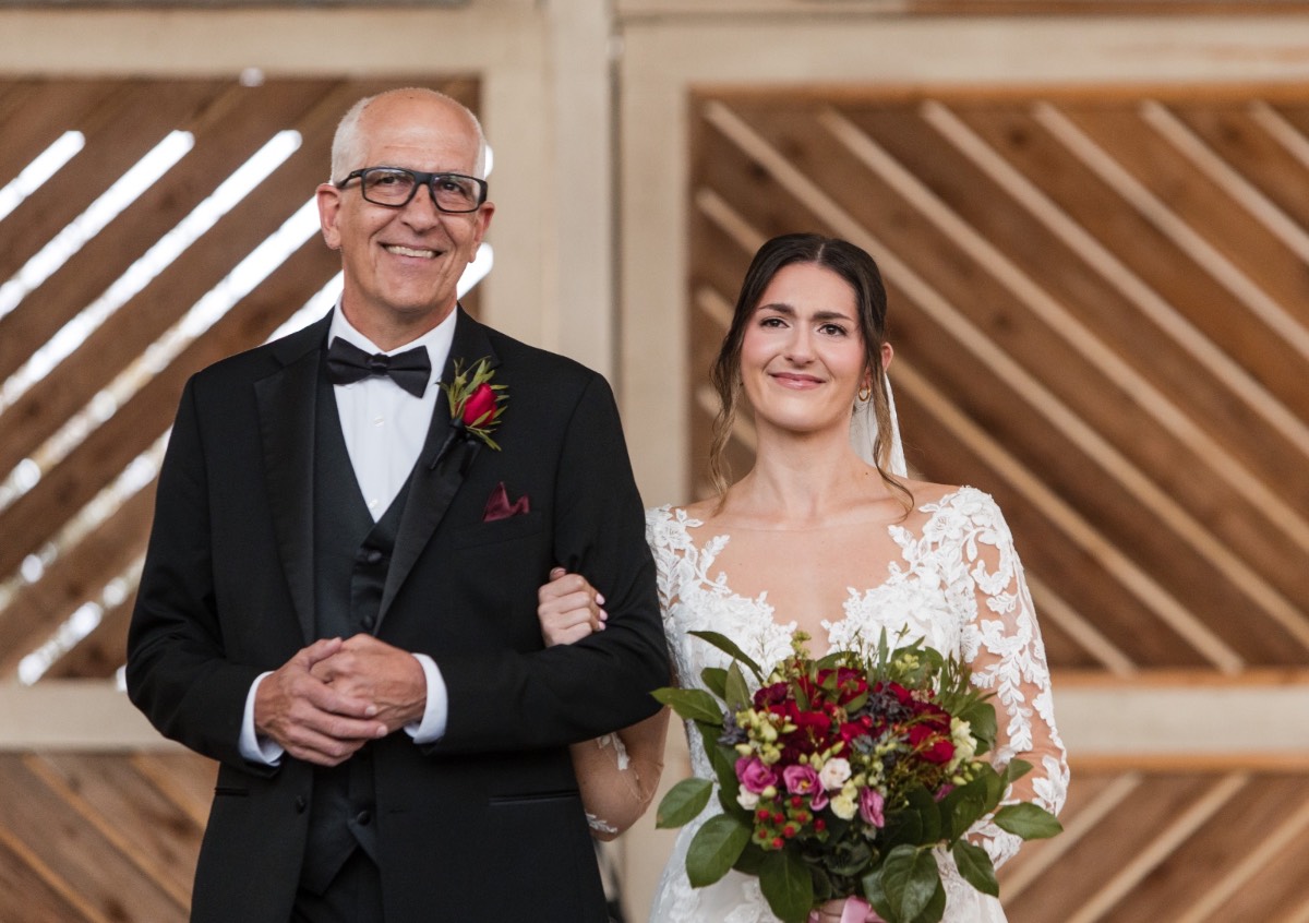 First look moment between S and M at rainy Barr Mansion.