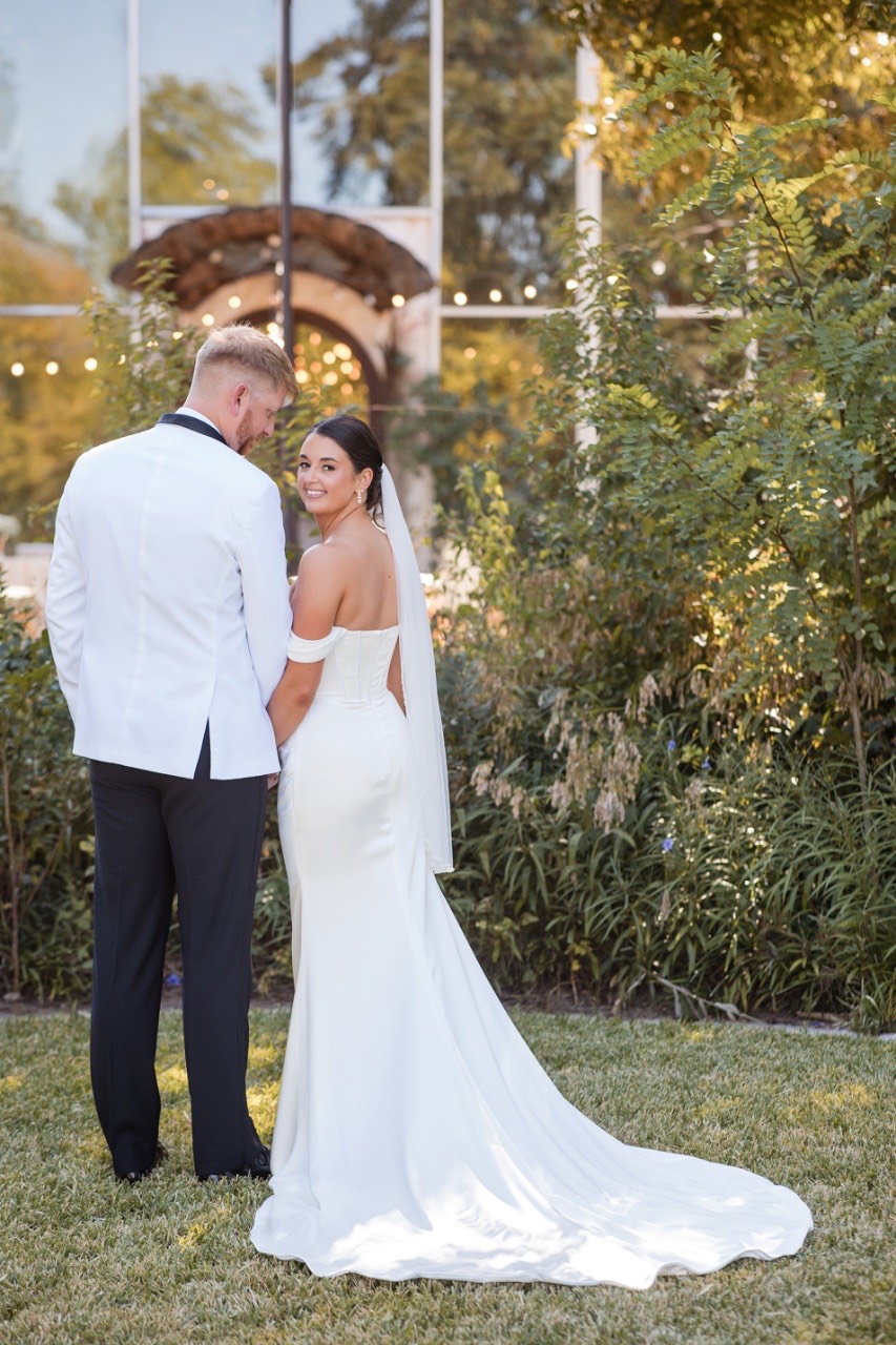 Videographer from The Bird and The Bear capturing first look moment for wedding film