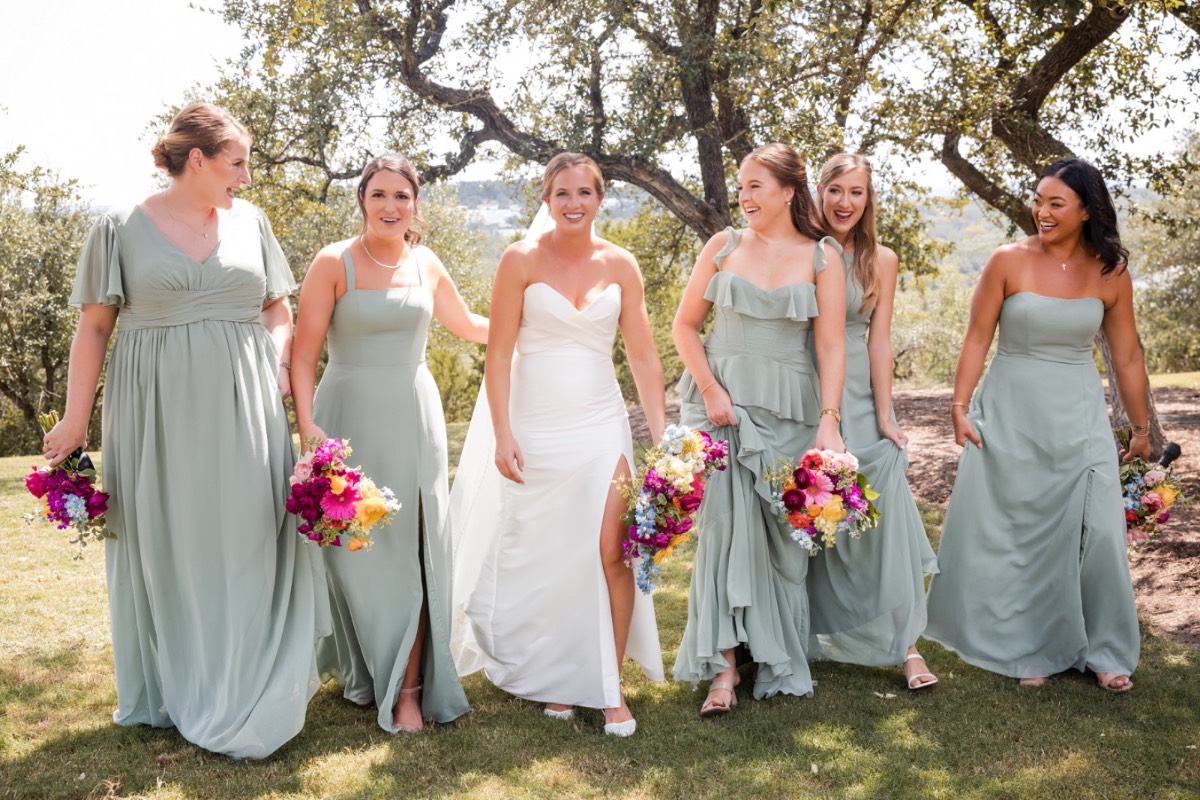 Groom M's face as bride A appears at the Canyonwood Ridge outdoor ceremony site