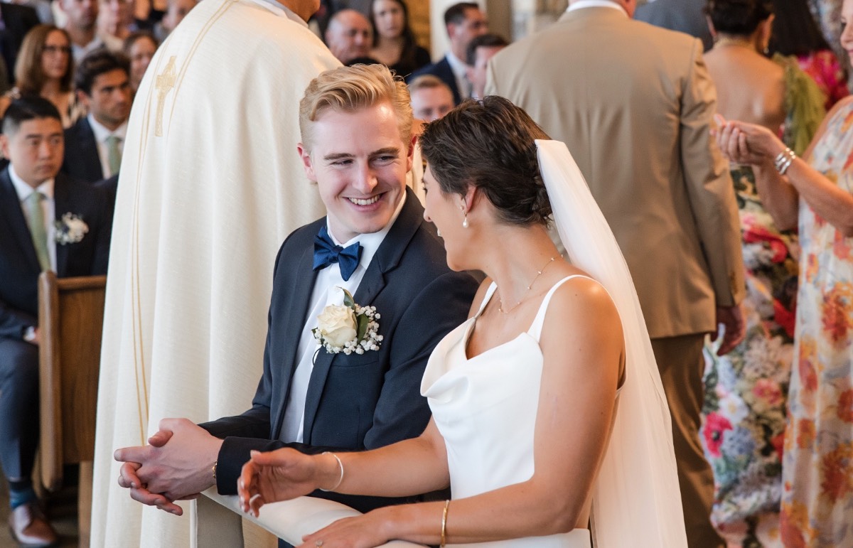 K and N exchanging vows at The Retreat at Balcones Springs ceremony venue