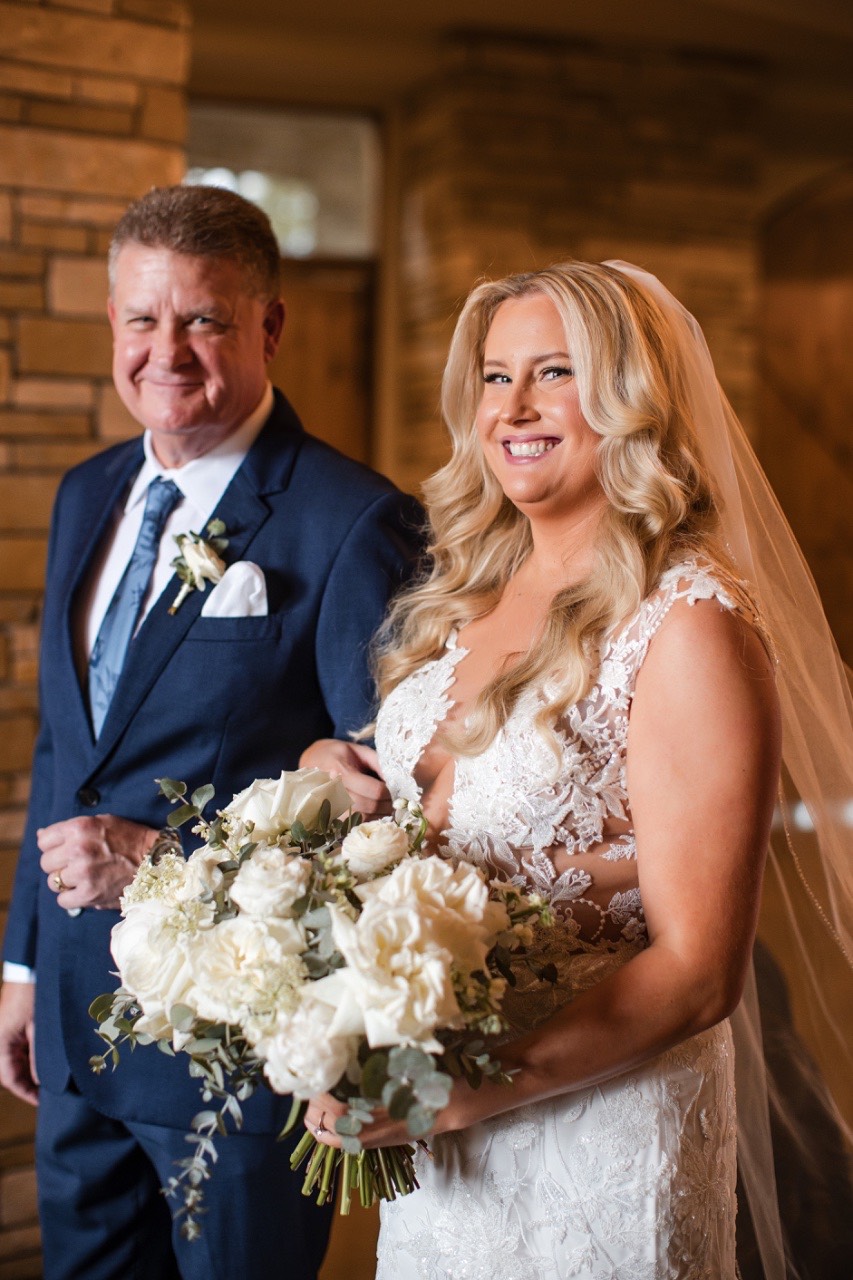 Romantic first look portrait at Canyonwood Ridge winter outdoor wedding venue