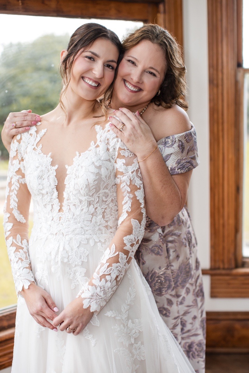 Bride's detailed makeup application before ceremony in Austin, Texas wedding.