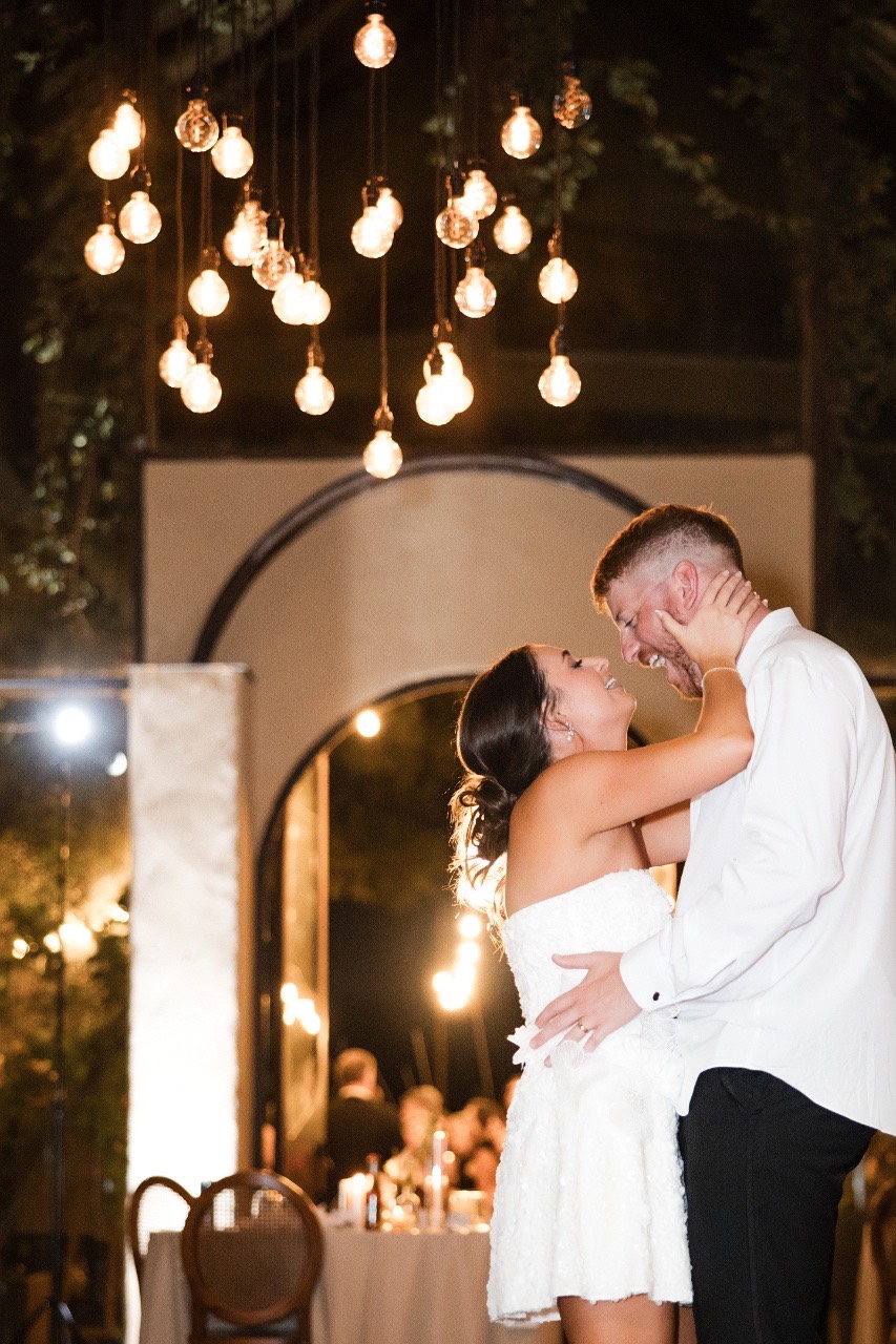 S adjusting cufflinks before fall Barr Mansion wedding ceremony in Austin Texas