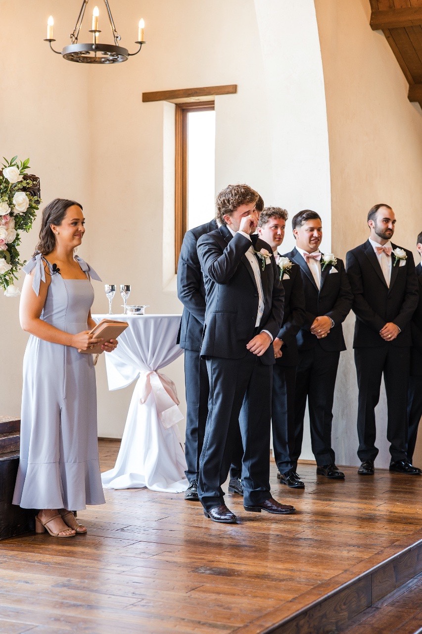 Wedding party celebrating P and B as newlyweds at Hidden River Ranch