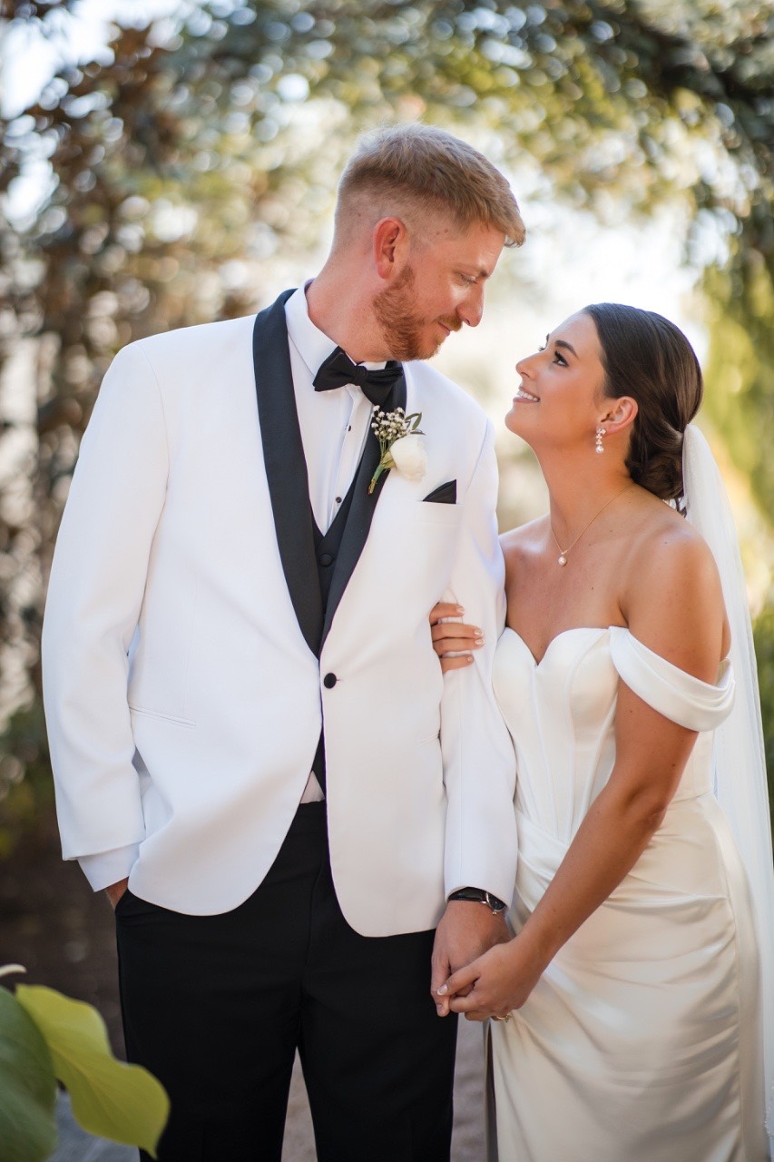 Groom's emotional response seeing bride for first time at Austin Barr Mansion