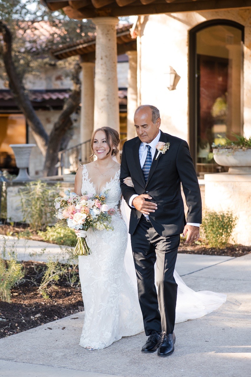 D and J's first kiss as married couple at Garey House wedding