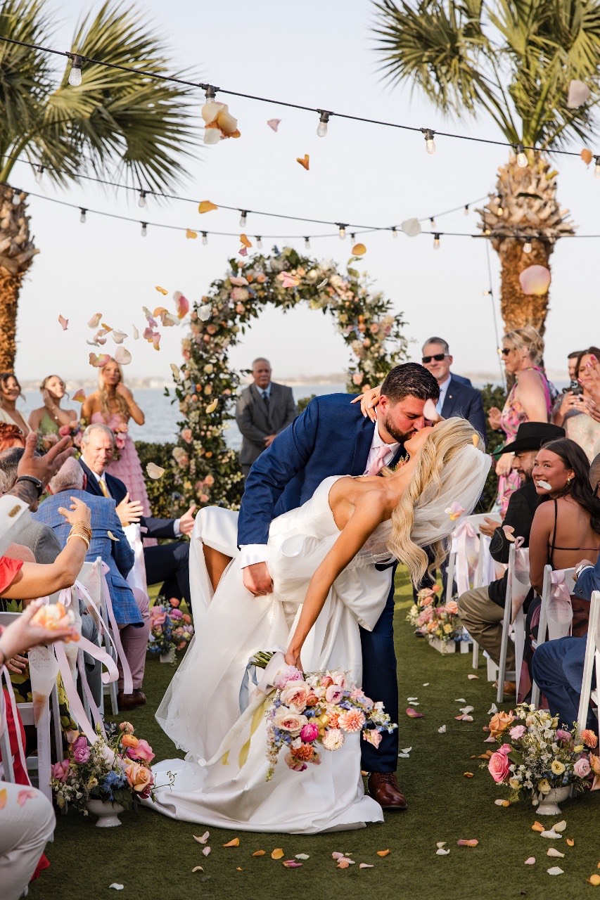 Wedding ceremony arch decorated for S and A at Horseshoe Bay venue