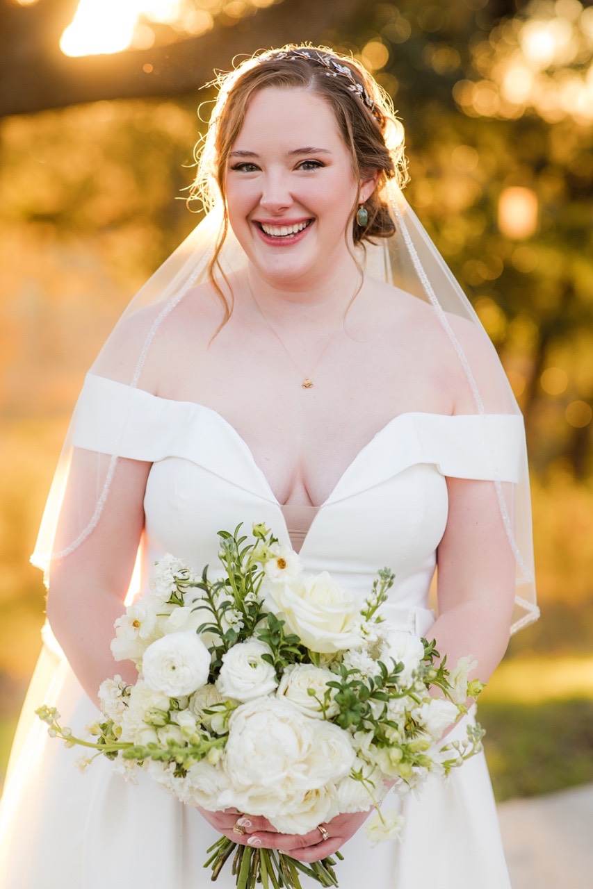 E and D dance together as newlyweds during reception at Liberty Hill venue.